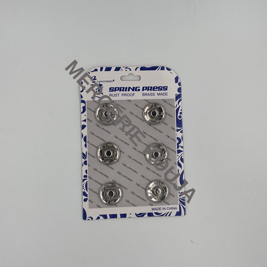 CAPSE DE CUSUT SPRING PRESS